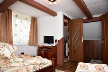 Фото номера Трехместный номер с видом на горы Гостевой дом Casa Edy г. Колибица 4